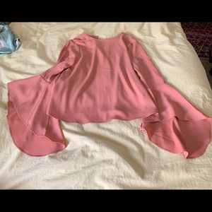 Orange/Pink colored blouse with bell sleeves